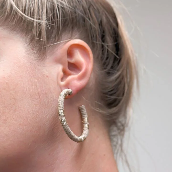 Best hoop earrings with geometric shapes for a modern and artistic appeal-Metallic Suede Hoop Earrings - Taupe