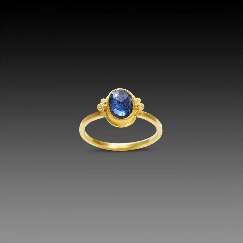 Rings with topaz stones for icy blue -Oval Blue Sapphire Ring with Diamonds