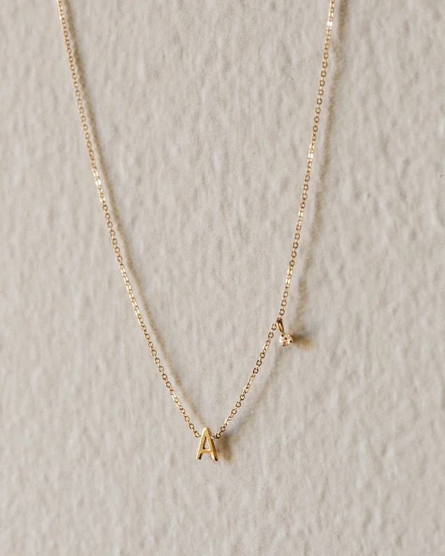 Personalized necklaces and pendants with coordinates for a meaningful location-based gift-14k gold initial necklace with small side diamond dangle