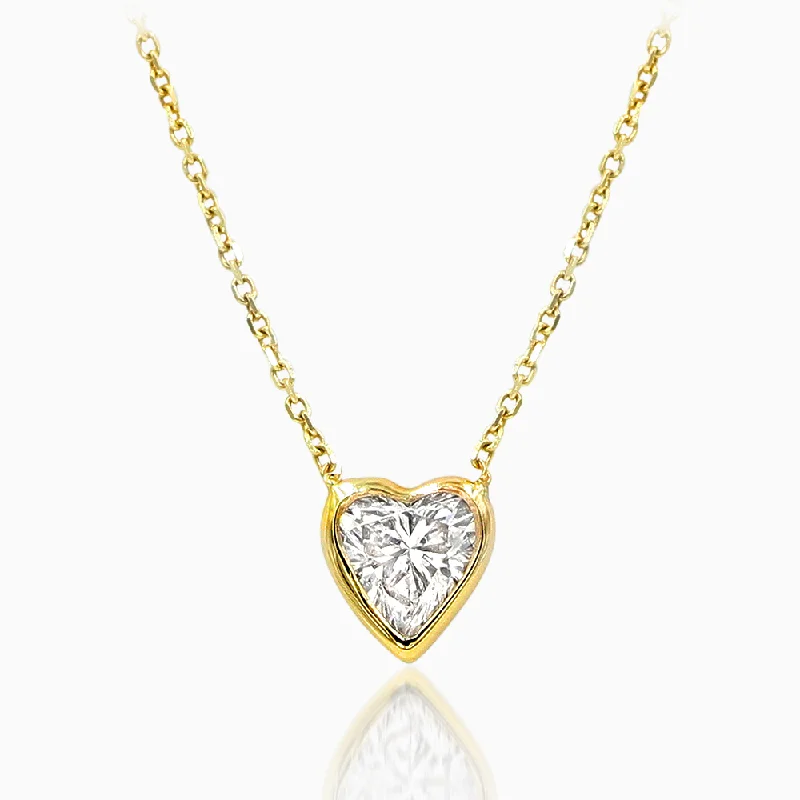 Necklaces and pendants with custom engravings for a personal, meaningful gift-Bezel Set Petite Heart Shaped Diamond Pendent set in 14kt Gold