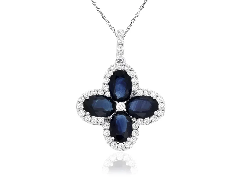 Best necklaces and pendants with butterfly wings for a delicate, graceful style-Blue Sapphire & Diamond Flower Pendant in 14kt Gold