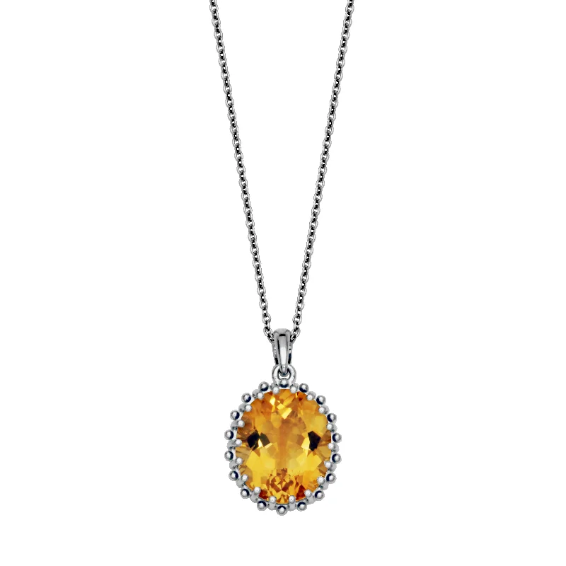 Trendy necklaces and pendants with statement pieces for a bold fashion statement-Sterling Silver 12x10mm Oval Citrine Solitaire Necklace by Samuel B.